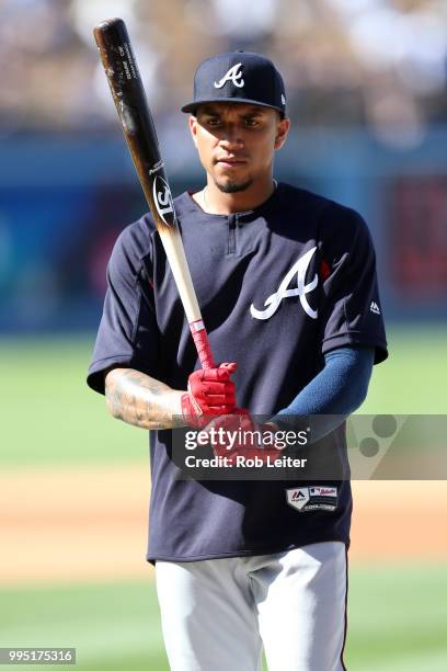 Johan Camargo of the Atlanta Braves looks on before the game against the Los Angeles Dodgers at Dodger Stadium on June 9, 2018 in Los Angeles,...