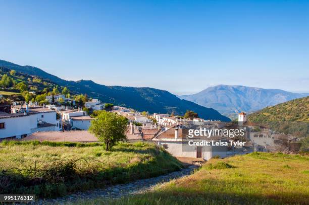 View over Capileira, the highest and most northerly village in the Poqueira river gorge, in the Alpujarra region in the Sierra Nevada, Andalusia,...