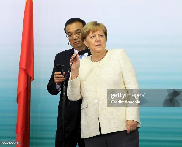 German Chancellor Angela Merkel and Chinese Premier Li Keqiang hold a press conference following a presentation on autonomous driving at the...