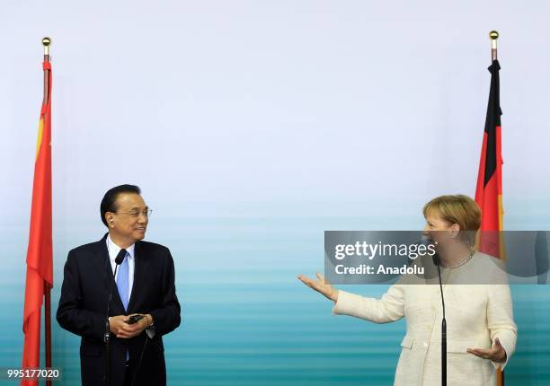 German Chancellor Angela Merkel and Chinese Premier Li Keqiang hold a press conference following a presentation on autonomous driving at the...