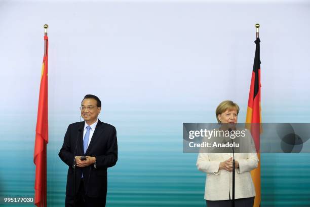 German Chancellor Angela Merkel and Chinese Premier Li Keqiang hold a press conference following a presentation on autonomous driving at the...