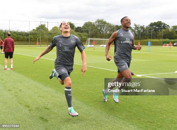 Hector Bellerin and Chuba Akpom of Arsenal during a training session at London Colney on July 10, 2018 in St Albans, England.