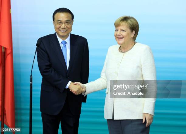 German Chancellor Angela Merkel and Chinese Premier Li Keqiang hold a press conference following a presentation on autonomous driving at the...