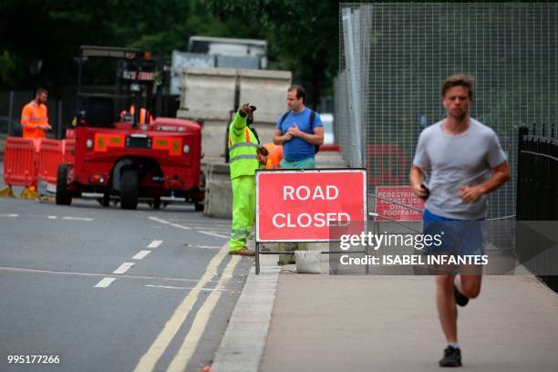 Security barriers are installed and roads closed close to Winfield House in Regent's Park, the US Ambassador's London residence, on July 10, 2018...