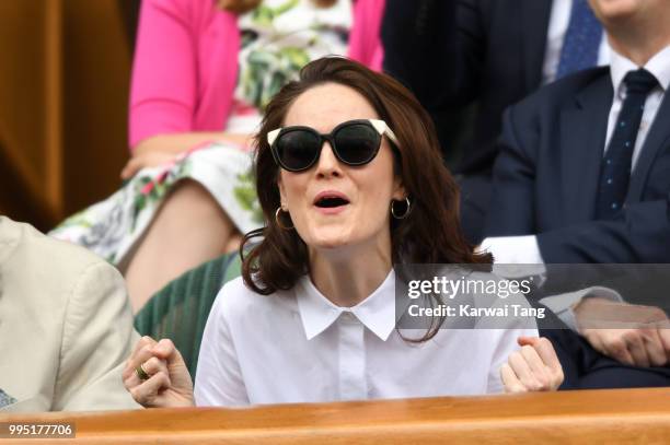 Michelle Dockery attends day eight of the Wimbledon Tennis Championships at the All England Lawn Tennis and Croquet Club on July 10, 2018 in London,...