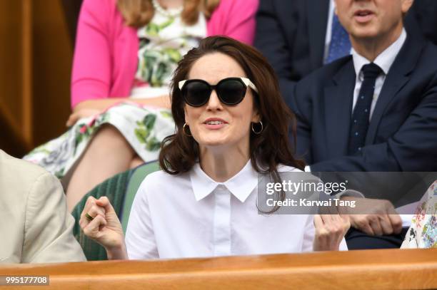 Michelle Dockery attends day eight of the Wimbledon Tennis Championships at the All England Lawn Tennis and Croquet Club on July 10, 2018 in London,...