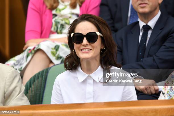 Michelle Dockery attends day eight of the Wimbledon Tennis Championships at the All England Lawn Tennis and Croquet Club on July 10, 2018 in London,...