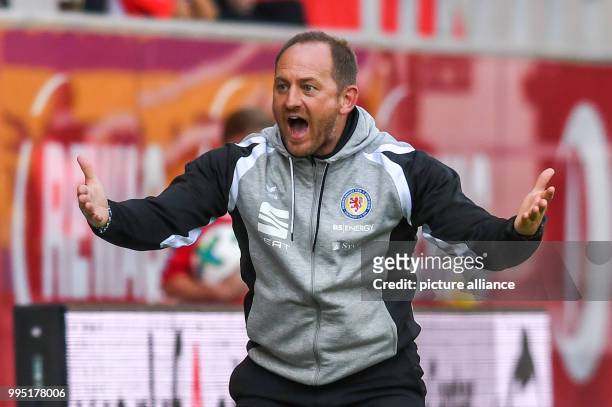 Braunschweig's head coach Torsten Lieberknecht enraged during the German 2nd Bundesliga match between Jahn Regensburg and Eintracht Braunschweig in...