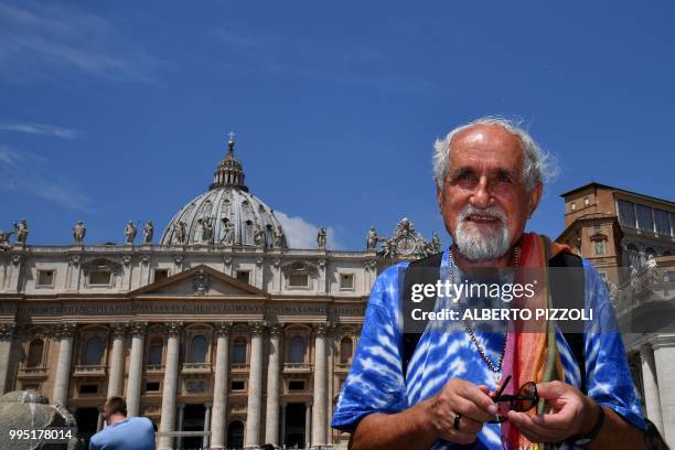 Father Alex Zanotelli poses at the St Peter's square at the Vatican on July 10, 2018. - Zanotelli's with other religious associations today began a...