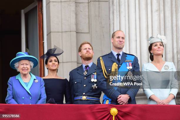 Queen Elizabeth II, Meghan, Duchess of Sussex, Prince Harry, Duke of Sussex, Prince William Duke of Cambridge and Catherine, Duchess of Cambridge...