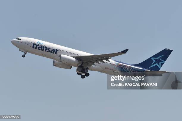 An Airbus A330 Air Transat flies on July 10 in Blagnac, southwestern France.