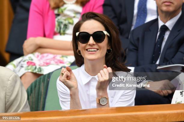 Michelle Dockery attends day eight of the Wimbledon Tennis Championships at the All England Lawn Tennis and Croquet Club on July 10, 2018 in London,...