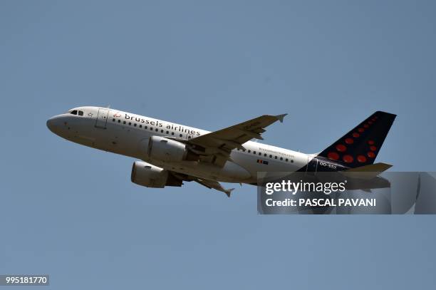 An Airbus A319 bleonging to the Brussels Airlines company flies, on July 10 in Blagnac, southwestern France.