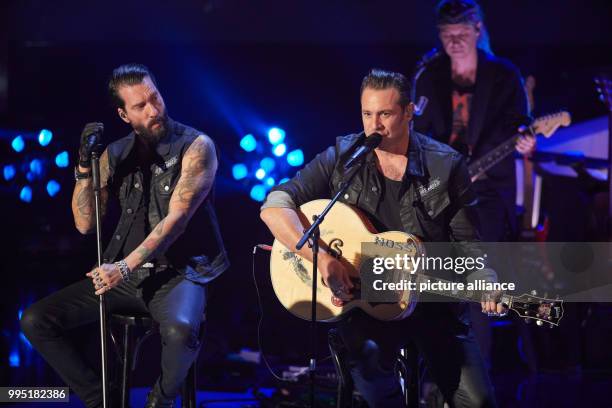 Alec Völkel and Sascha Vollmer perform on stage at the television recording of 'Nena: Nothing Wasted' in Hamburg, Germany, 21 September 2017. The...