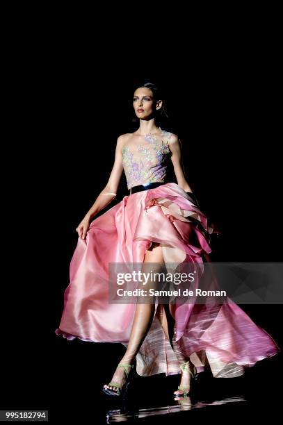 Model walks the runway during the Hannibal Laguna show at Mercedes Benz Fashion Week Madrid Spring/Summer 2019 on July 10, 2018 in Madrid, Spain.