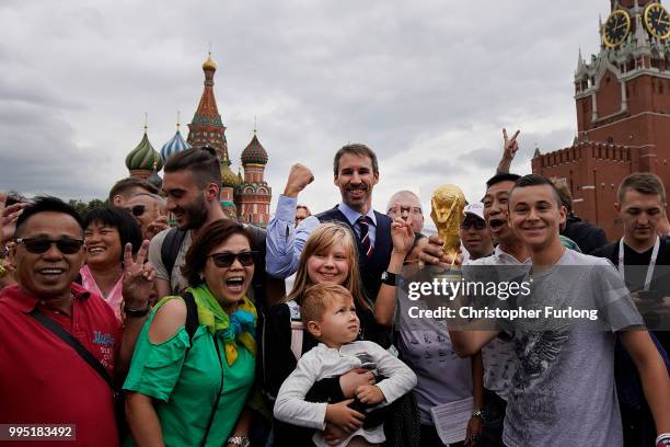 Gareth Southgate lookalike Neil Rowe causes a stir as football fans, TV crews and tourists mistake him for the real England manager as he tours Red...