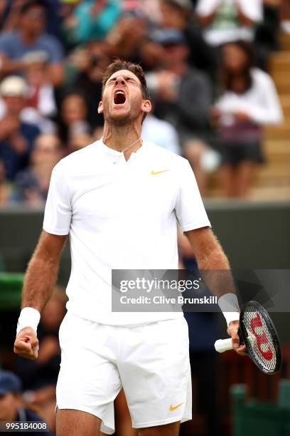 Juan Martin Del Potro of Argentina celebrates after defeating Gilles Simon of France in their Men's Singles fourth round match on day eight of the...