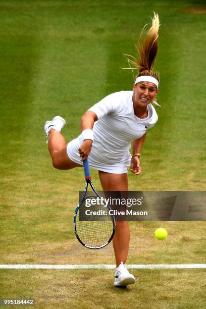 Dominika Cibulkova of Slovakia serves against Jelena Ostapenko of Latvia during their Ladies' Singles Quarter-Finals match on day eight of the...