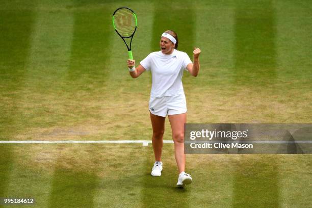 Jelena Ostapenko of Latvia celebrates after defeating Dominika Cibulkova of Slovakia in their Ladies' Singles Quarter-Finals match on day eight of...