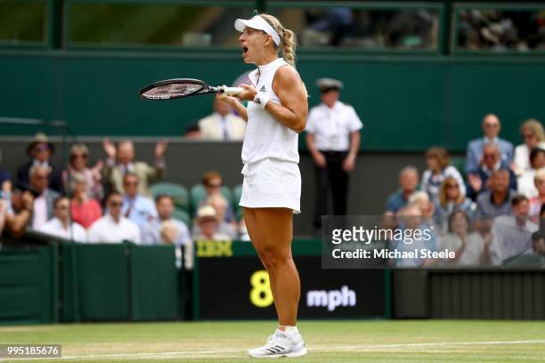 Angelique Kerber of Germany celebrates after defeating Daria Kasatkina of Russia during their Ladies' Singles Quarter-Finals match on day eight of...