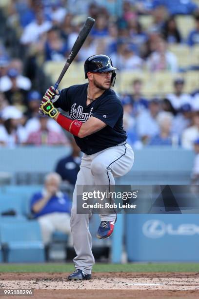 Tyler Flowers of the Atlanta Braves bats during the game against the Los Angeles Dodgers at Dodger Stadium on June 9, 2018 in Los Angeles,...