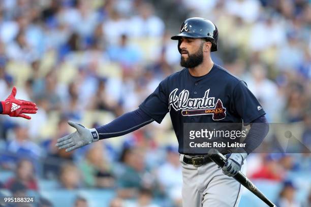 Nick Markakis of the Atlanta Braves celebrates during the game against the Los Angeles Dodgers at Dodger Stadium on June 9, 2018 in Los Angeles,...