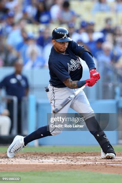 Johan Camargo of the Atlanta Braves bats during the game against the Los Angeles Dodgers at Dodger Stadium on June 9, 2018 in Los Angeles,...