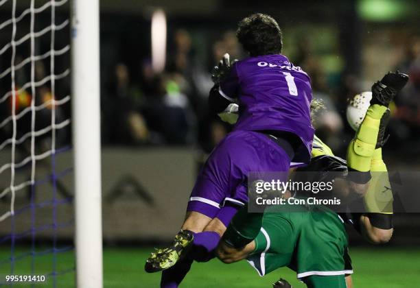 Goalkeeper Ryan Scott of Bentleigh Greens dives for the ball during the NPL Dockerty Cup match between Heidelberg United and Bentleigh Greens at Jack...