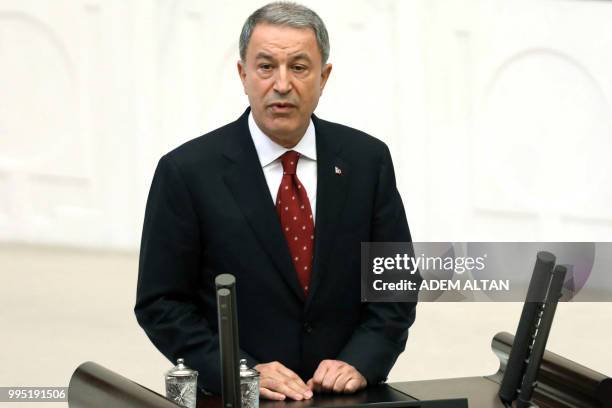 Turkey's newly appointed National Defence Minister Hulusi Akar swears in at the Grand National Assembly of Turkey in Ankara, Turkey on July 10, 2018.