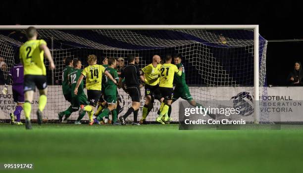 Players clash during the NPL Dockerty Cup match between Heidelberg United and Bentleigh Greens at Jack Edwards Reserve on July 10, 2018 in Melbourne,...