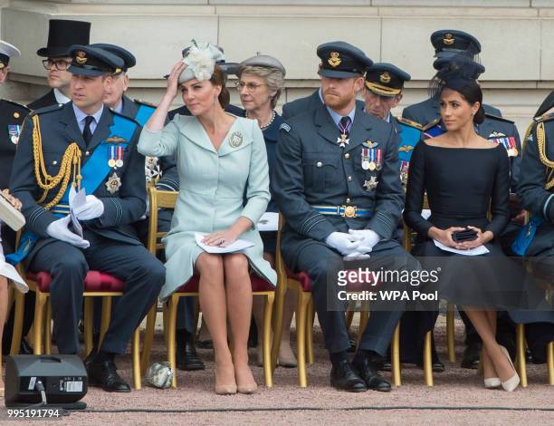 Prince William, Duke of Cambridge, Catherine, Duchess of Cambridge, Prince Harry, Duke of Sussex and Meghan, Duchess of Sussex during the RAF 100...