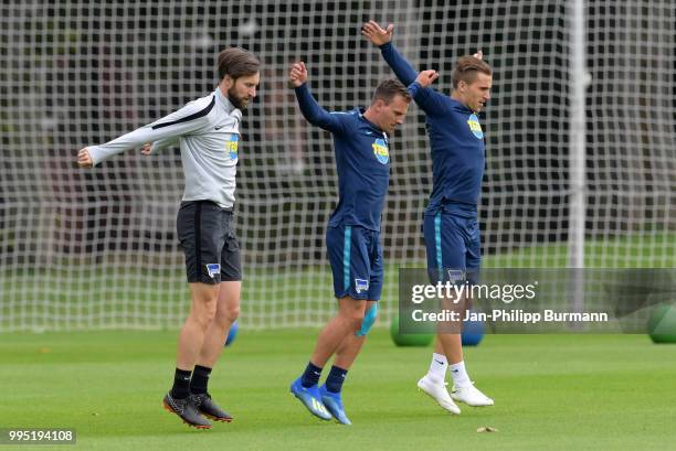 Athletic trainer Hendrik Vieth, Vladimir Darida and Peter Pekarik of Hertha BSC during the training at the Schenkendorfplatz on July 10, 2018 in...