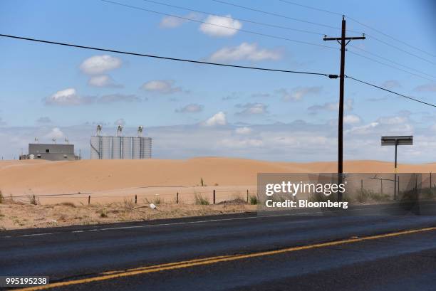 The Hi-Crush Partners LP sand mining facility stands in Kermit, Texas, U.S., on Wednesday, June 20, 2018. In the West Texas plains, frack-sand mines...