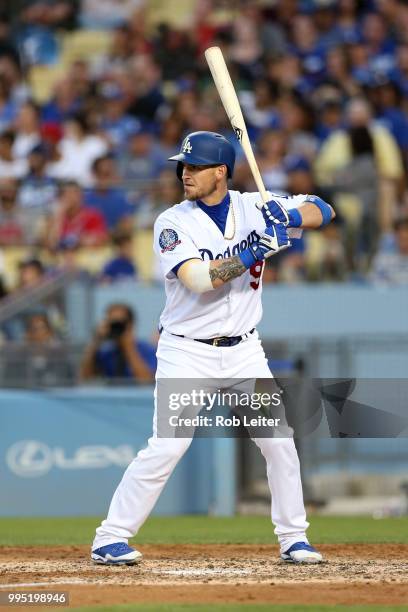 Yasmani Grandal of the Los Angeles Dodgers bats during the game against the Atlanta Braves at Dodger Stadium on June 9, 2018 in Los Angeles,...