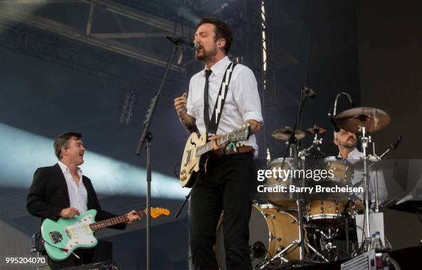 Frank Turner performs with band members of Frank Turner and The Sleeping Souls at the Festival dété de Québec on July 9, 2018 in Queandec City,...