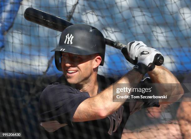 Brett Gardner of the New York Yankees smiles as he takes batting practice before the start of MLB game action against the Toronto Blue Jays at Rogers...