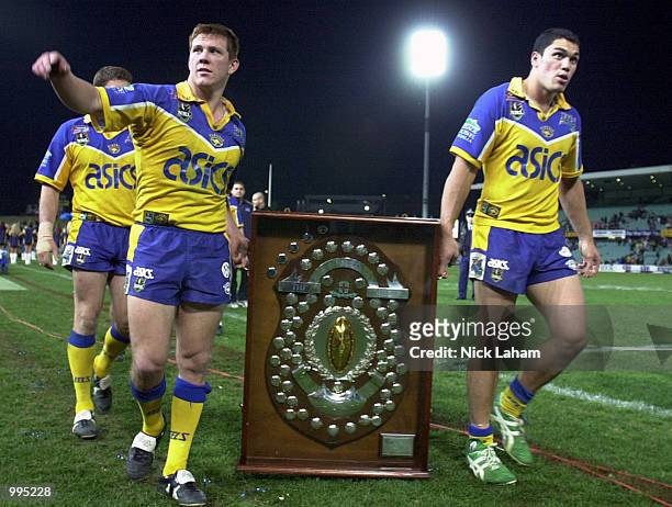 Daniel Irvine and David Vaealiki of the Eels during the Eels lap of honour with the minor premiership trophy after the Eels finished top of the...
