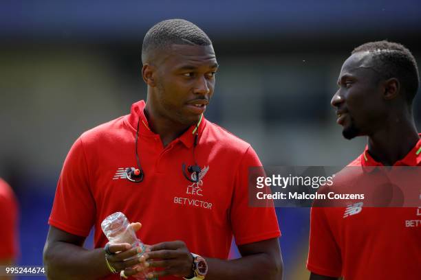 Daniel Sturridge of Liverpool chats to Naby Keita before the Pre-season friendly between Chester City and Liverpool at Swansway Chester Stadium on...