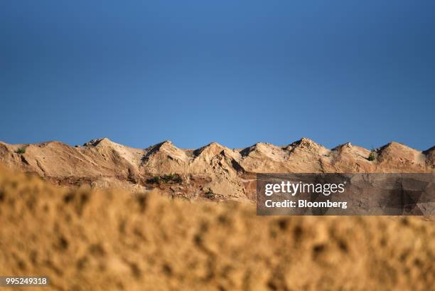 Sand dunes sit at the Black Mountain Sand LLC Vest Mine in Winkler County, Texas, U.S., on Wednesday, June 20, 2018. In the West Texas plains,...