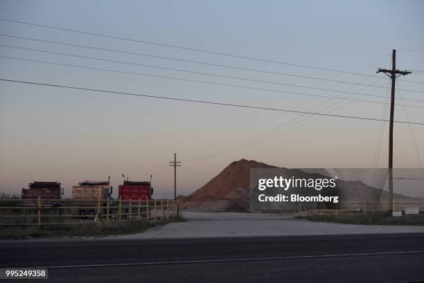 Sand pile stands at a mining facility in Winkler County, Texas, U.S., on Wednesday, June 20, 2018. In the West Texas plains, frack-sand mines...