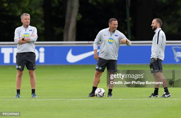 Assistant coach Rainer Widmayer, coach Pal Dardai and assistant coach Admir Hamzagic of Hertha BSC during the training at the Schenkendorfplatz on...