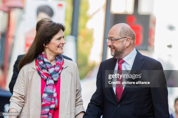 Chancellor candidate Martin Schulz and his wife Inge arrive at the city hall to cast their votes for the German Federal Election 2017 in Wuerselen,...