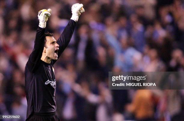 Deportivo Coruna's goalkeeper Francisco Molina celebrates his team's first goal against Real Madrid in their Spanish first league football match at...