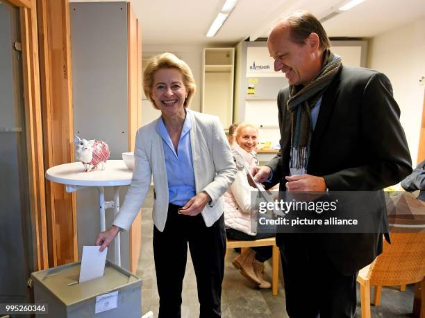 Minister of Defence Ursula von der Leyen and her husband Heiko von der Leyen cast their votes at a polling station in Beinhorn, Germany, 24 September...