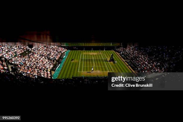 Serena Williams of the United States serves against Camila Giorgi of Italy during their Ladies' Singles Quarter-Finals match on day eight of the...