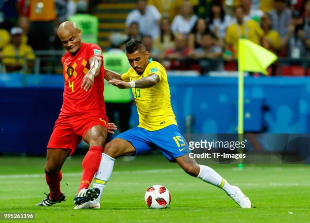 Vincent Kompany of Belgium and Paulinho of Brazil battle for the ball during the 2018 FIFA World Cup Russia Quarter Final match between Brazil and...