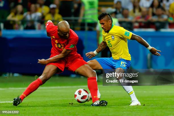 Vincent Kompany of Belgium and Paulinho of Brazil battle for the ball during the 2018 FIFA World Cup Russia Quarter Final match between Brazil and...