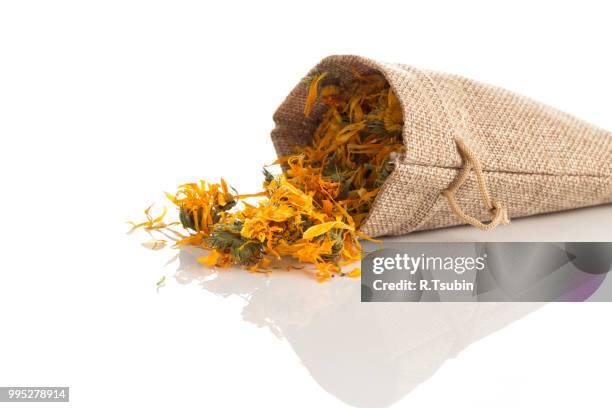 calendula flower tea for infusion - calendula stock pictures, royalty-free photos & images