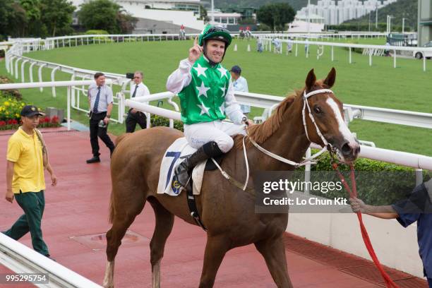 Jockey Tommy Berry riding Pakistan Friend wins Race 9 Tai Mong Tsai Handicap at Sha Tin racecourse on July 8 , 2018 in Hong Kong.