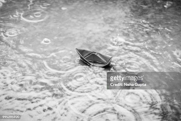paper boat - monochrome - neha gupta stock pictures, royalty-free photos & images
